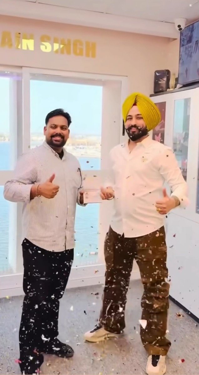 Sukhchain Travel and Tourism with a happy client