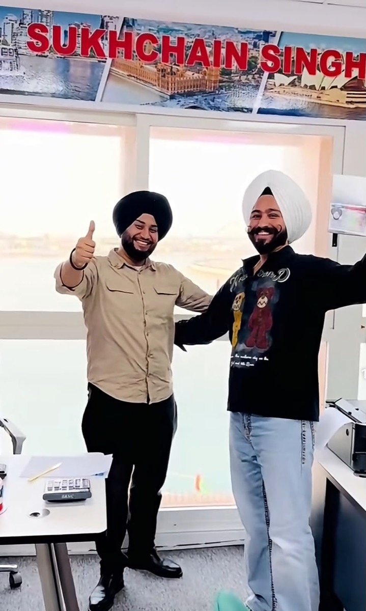 Sukhchain Travel and Tourism with a happy client