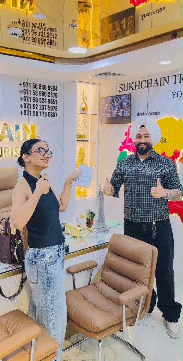 Sukhchain Travel and Tourism with a happy client