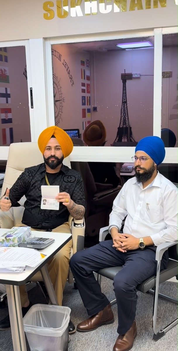 Sukhchain Travel and Tourism with a happy client