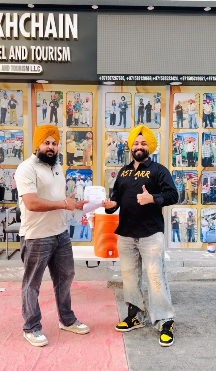 Sukhchain Travel and Tourism with a happy client